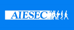Logo AIESEC z białym prostokątem i sylwetkami ludzi. Kontekst: organizacja studencka.